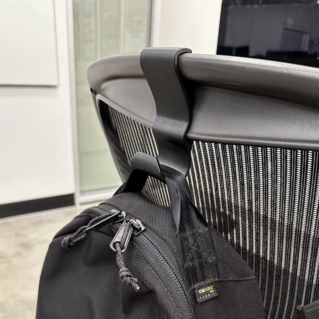Backpack on hanger on Herman Miller Aeron office chair Backpack on hanger on Herman Miller Aeron office chair
